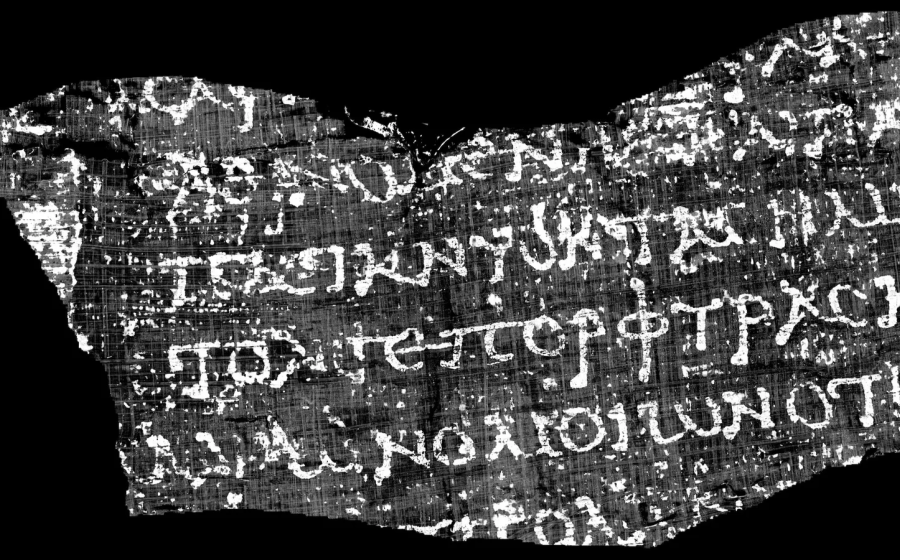 Scientists revealed an ancient Greek text from a carbonized Herculaneum scroll using high-resolution scanning and artificial intelligence