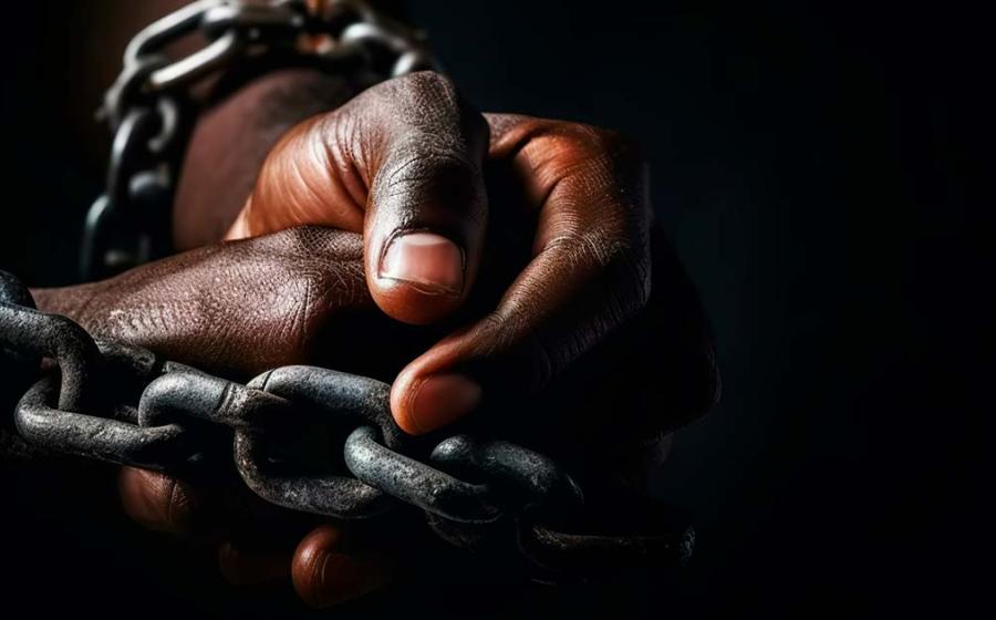 An African slave in chains. Source:  colnihko / Adobe Stock.