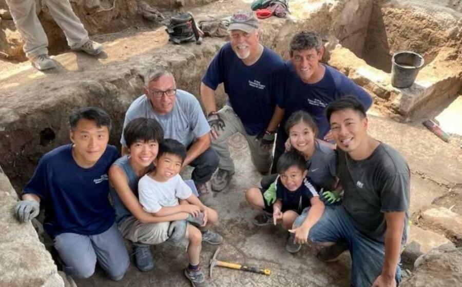 Archaeologists pose near the St Peter’s inscription found on the north shore of the Sea of Galilee, Israel, which could finally prove a number of things about the first apostle of Jesus. Source: El Araj Excavation Project