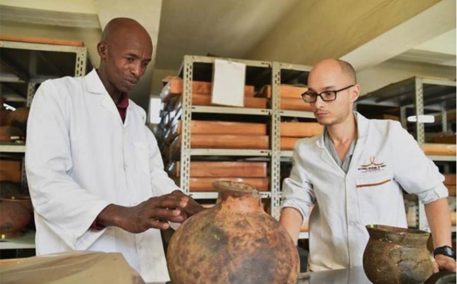 Paper co-author Steven Goldstein discussing pottery traditions associated with early farmers in Kenya with Christopher Kirwa of NMK Source: Jennifer Miller