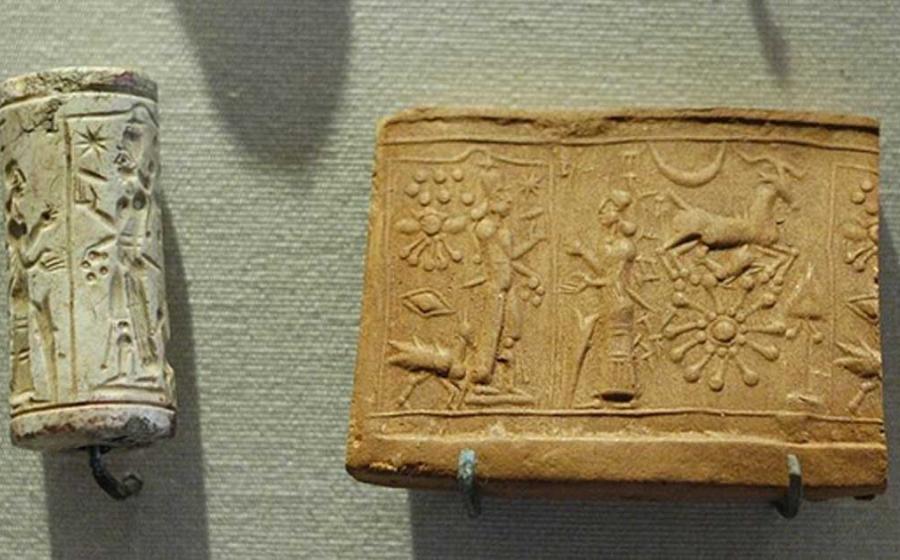 Cult scene: the worship of the sun-god, Shamash. Limestone cylinder-seal, Mesopotamia. 