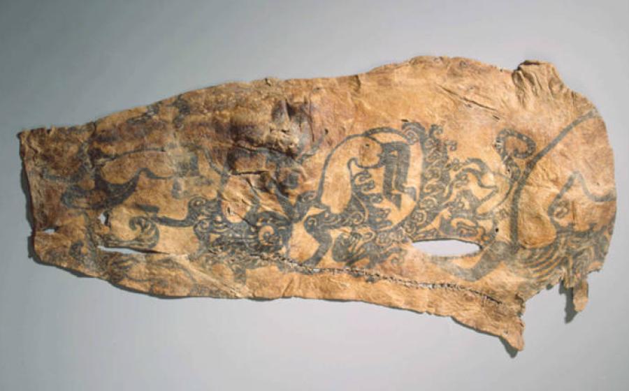 Ancient Pazyryk mummy tattoo on right arm of chief from Pazyryk Barrow no. 2. 
