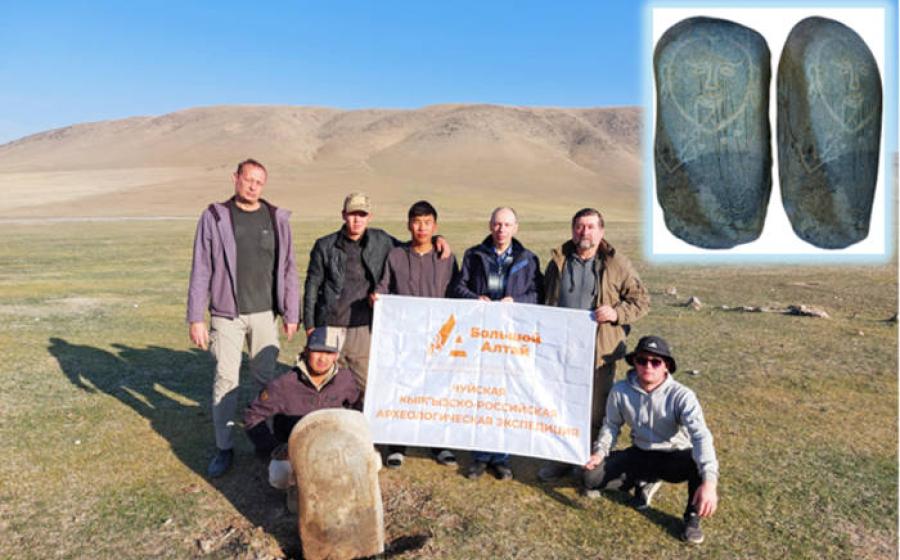The research group in Kyrgyzstan with the Turkic stone sculpture.
