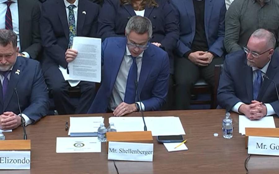 Mr Shellenberger holds up the whistleblower report at the UAP Congressional Hearing.