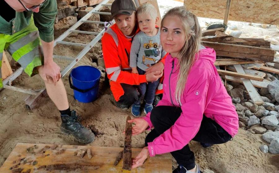 Anne and Oddbjørn Holum Heiland have discovered a Viking age burial with weaponry and jewelry from about 1200 years ago during a home renovation. Source: Joakim Wintervoll/Science Norway