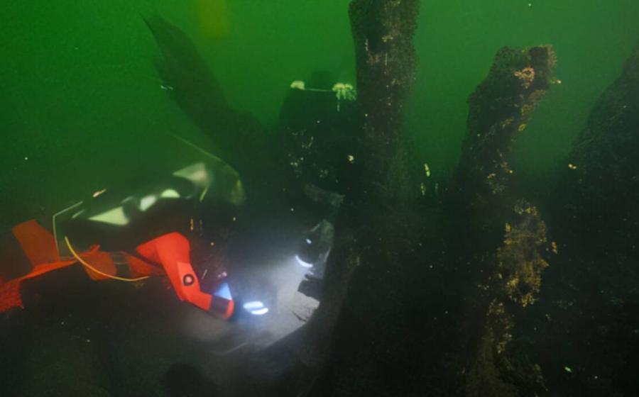 Brendan Foley and a colleague dig up the wreck of the Gribshunden in 2022. The royal Danish flagship sank off the coast of Sweden more than 500 years ago. 
