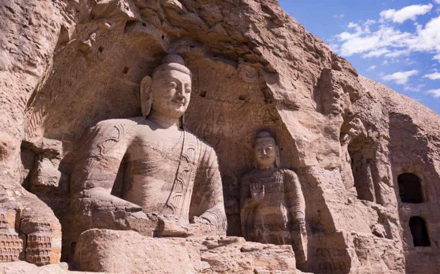 The Yungang Grottoes are a UNESCO World heritage site in Datong, Shanxi province, China. Source: mijun/Adobe Stock