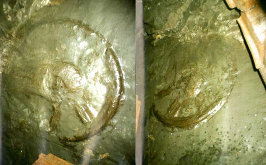 Two photos of the ancient wheel.