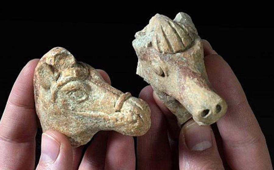 Left: The clay horse head from the Hellenistic period. Right: The Iron Age clay horse head