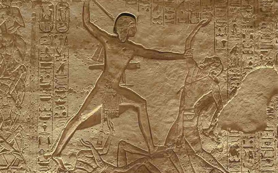Depiction of Ramesses II slaying one enemy while trampling another, from a rock-cut relief at Abu Simbel	Source: Aoineko/CC BY-SA 3.0