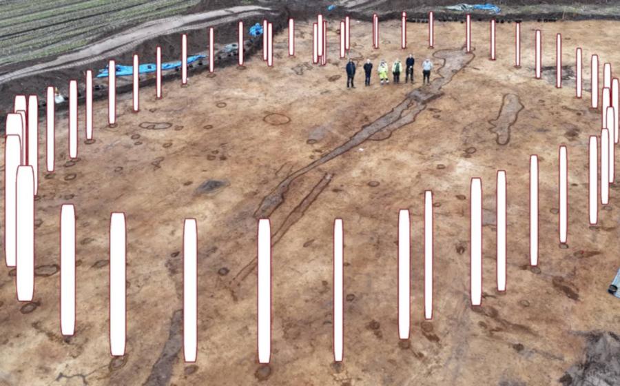Photo of timber circle site in Denmark, with overlay showing how it would have looked with posts installed 4,000 years ago.