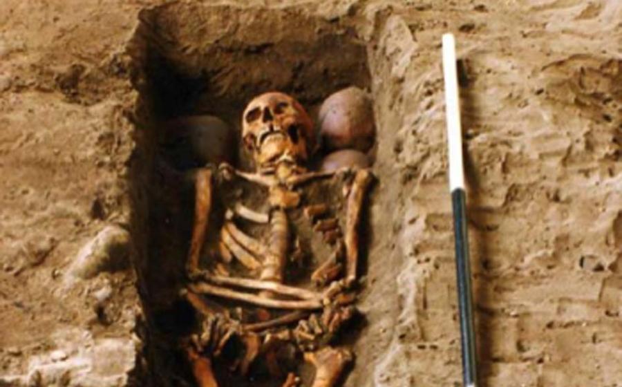 The grave holding one of the skeletons and the four skulls. (FAS Heritage / Fair UseThe reconstructed face of the clansman who was killed in the 15th century. 
