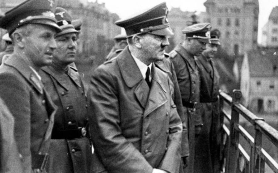 1941 picture of Adolph Hitler with several Nazi officials. On his immediate right is Martin Bormann, who was perhaps the most famous Nazi known to have escaped to South America after the war.