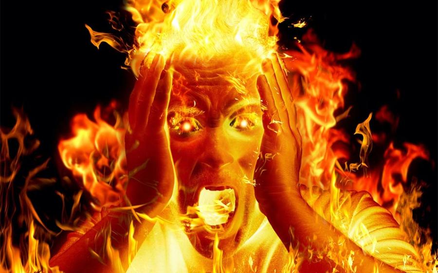 Man on fire showing representation of one of the victims at the Ball of the Burning Men (‘Bal des Ardents’)     Source: Daniele Depascale / Adobe stock