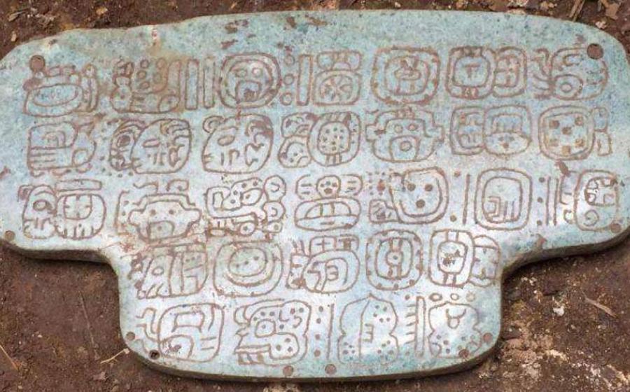 The newly-discovered jewel with 30 hieroglyphs on its back, a private message seen mostly by the king who wore it. 