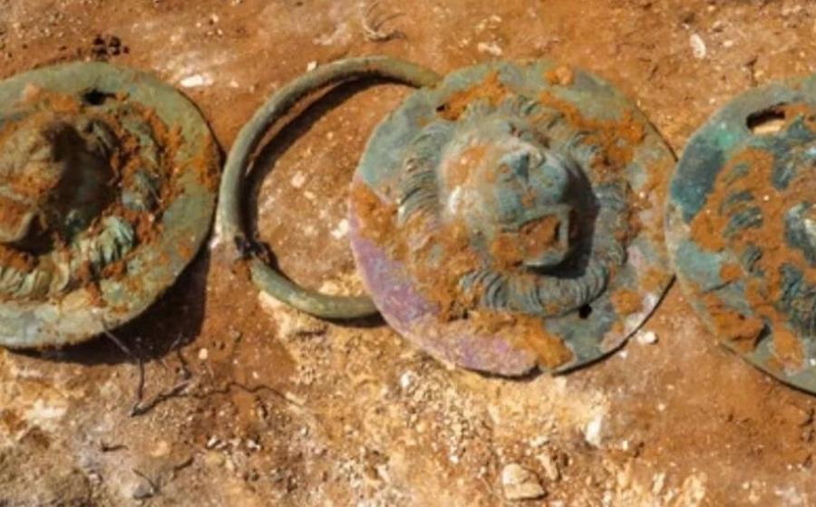 Three of the discs that were found inside the one Roman grave at Khirbat Ibreika.