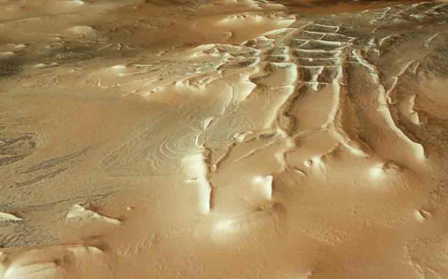 No Ziggy? The Inca City at the Martian Pole surrounded by thousands of spiders from Mars, here seen as tiny dark spots. Source: European Space Agency / CC-BY-SA 3.0.