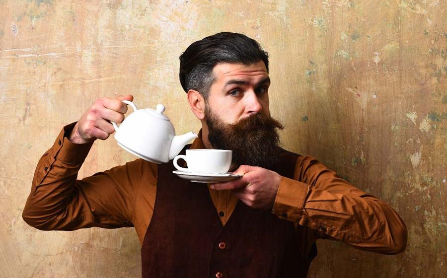 A gentleman and a moustache cup. Source: be free / Adobe Stock
