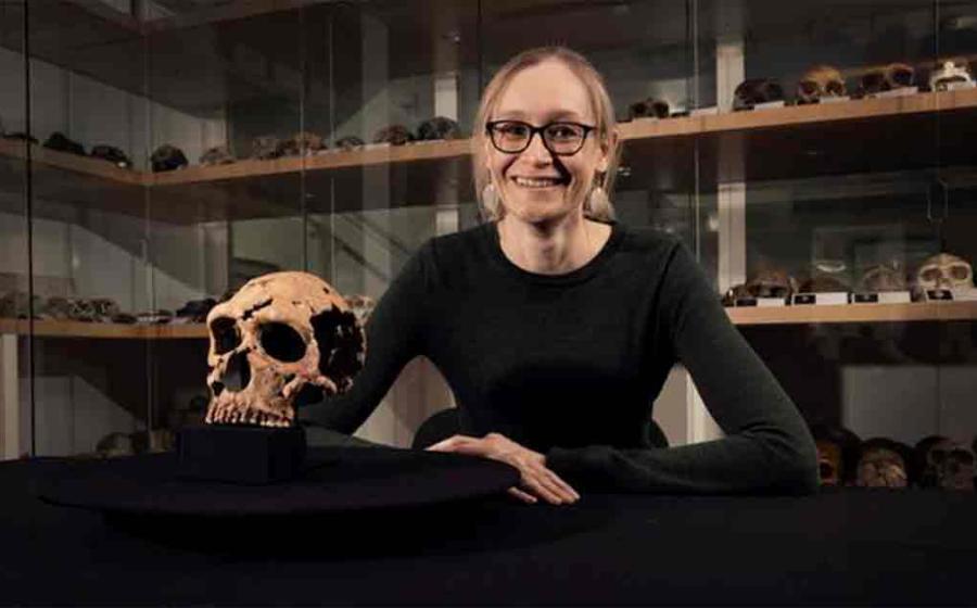 Dr Emma Pomeroy (University of Cambridge) with the skull of Shanidar Z in the Henry Wellcome Building in Cambridge, home of the University’s Leverhulme Centre for Human Evolutionary Studies. 	Source: BBC Studios/Jamie Simonds/University of Cambridge