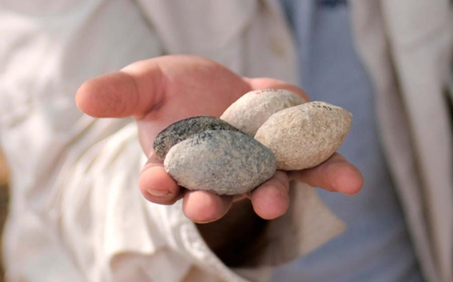 Prehistoric slingstones used for warfare 7200 years ago in Israel. Source: Emil Aladjem/Israel Antiquities Authority