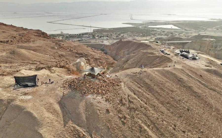  Broad view of excavation site in Nahal Zohar valley, with excavation site on upper section of pyramidal structure visible in the center.