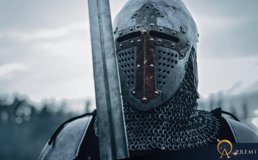 Medieval knight wearing armor, ready to fight in battle.