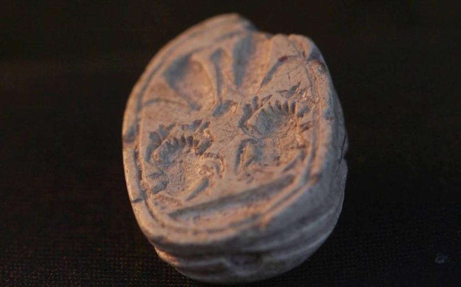 The scarab amulet with seal found by Ziv Nitzan at Tel Azeka, Israel.