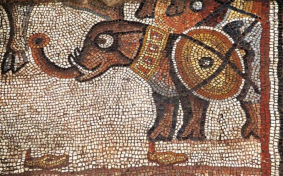 Elephant Mosaic, Huqoq, Galilee region, Israel, featuring an elephant alongside other soldiers and war animals, as well as an elder holding a scroll surrounded by young men with sheathed swords.