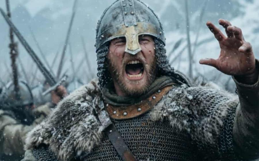 A fierce Viking warrior shouts a war cry mid-battle on a chaotic, snowy field.