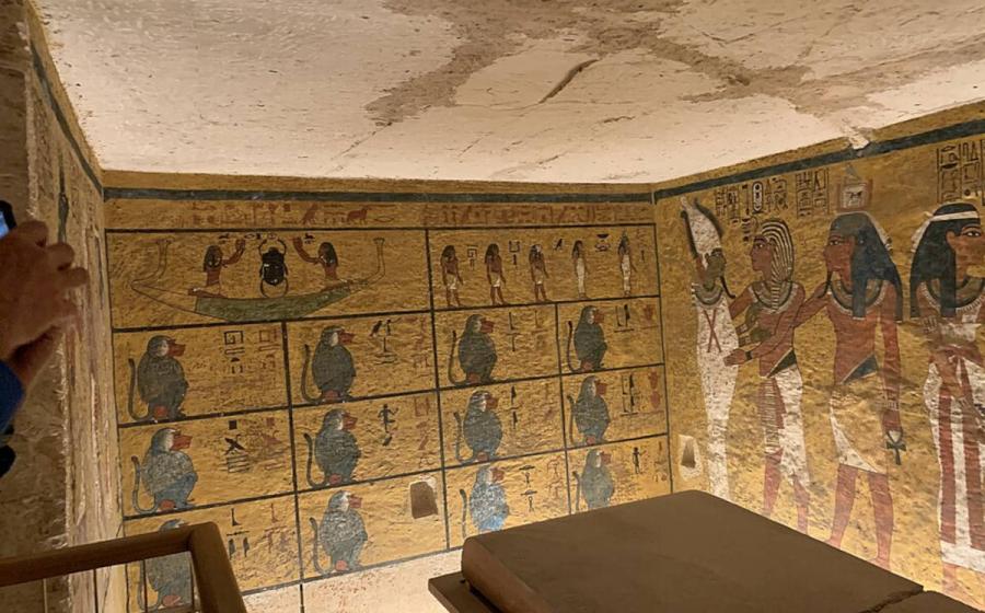 Tutankhamun burial chamber and sarcophagus, showing lid of the sarcophagus broken in two.