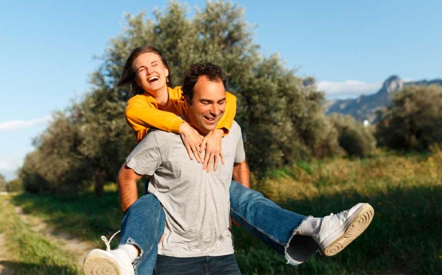 Wife-carrying. Source: Алина Битта / Adobe Stock.