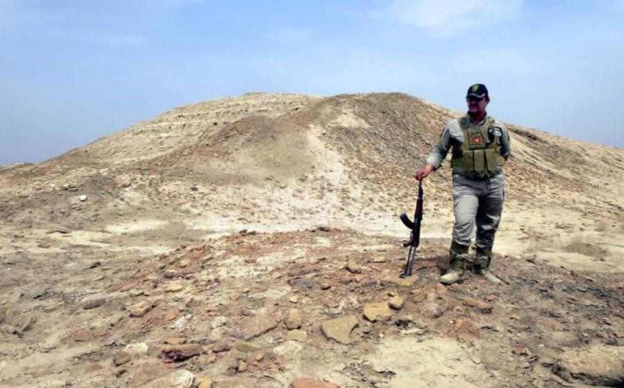 Eridu, southwest of Nasiriyah, Iraq, the world's oldest city. The ziggurat seen here may be the oldest temple on earth. 