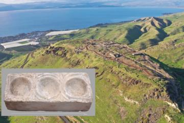 Aerial view of the Hippos Sussita excavation site on the mountain overlooking the Sea of Galilee. Inset; Marble block featuring three hemispheric cavities.