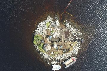 Aerial view of the Loch Bhorgastail crannog on the Isle of Lewis, Scotland