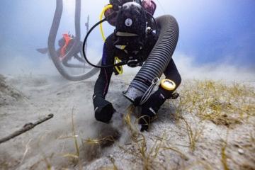 marine archaeologists excavate the wreck of the Mentor, off the coast of Kythera, Greece.