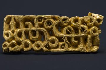 The richly decorated 1,500-year-old gold sword scabbard fitting.