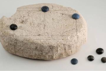 Incised limestone “board” from Coriovallum (Heerlen), Netherlands.