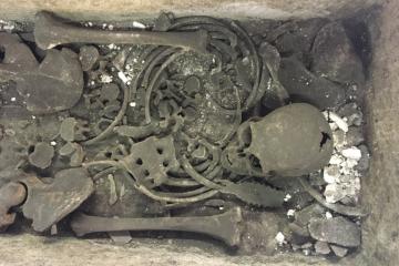Interior of the Westminster Abbey sarcophagus holding the skeletal remains prior to in situ cleaning.   