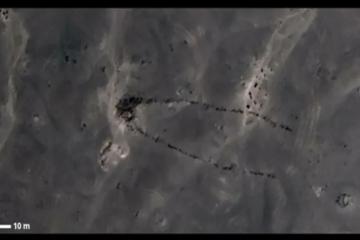 Aerial view of the excavated monument (tumulus, antennae and satellite stone mound).