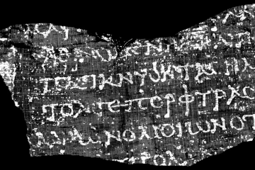 Scientists revealed an ancient Greek text from a carbonized Herculaneum scroll using high-resolution scanning and artificial intelligence