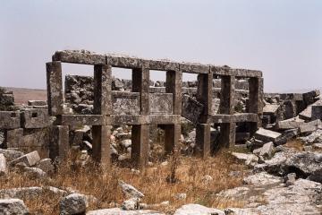 Portico of an unidentified structure in Ba'ude, showcasing the robust limestone architecture characteristic of the region