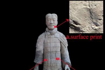 Terracotta figurine and one of the fingerprints on it.  