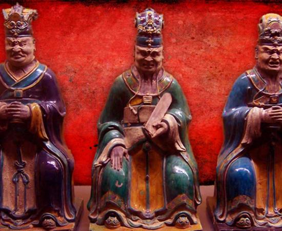 Figurines representing three of the ten judges of Diyu and Red Maw