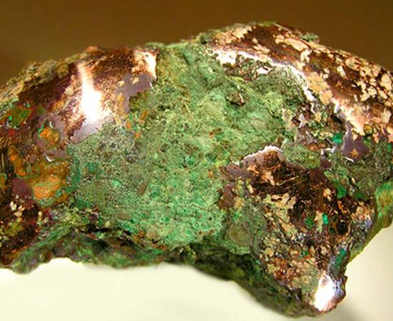 Native copper nugget from glacial drift, Ontonagon County, Michigan. An example of the raw material worked by the people of the Old Copper Complex. (Rob Lavinsky, iRocks.com/CC BY-SA 3.0);deriv.