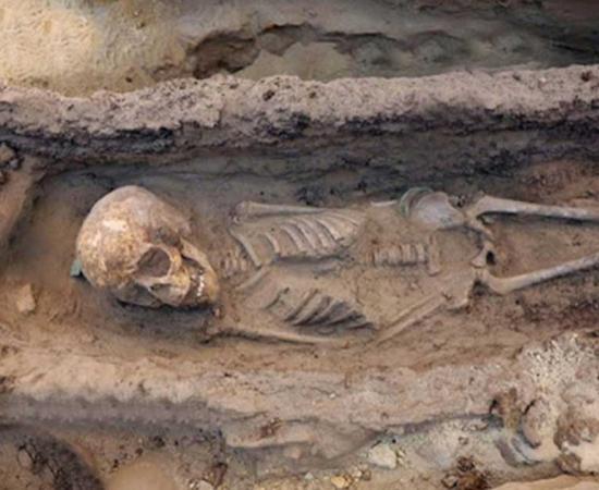 The skeleton of a child between the age of 6 and 9 found with various grave goods.
