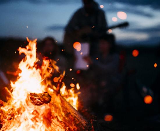 Christian group burns ‘satanic objects’ in bonfire. Credit: Andris / Adobe Stock
