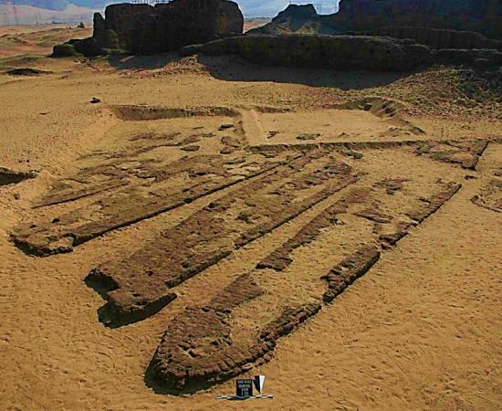 Some of the Abydos boats in their brick-built graves.