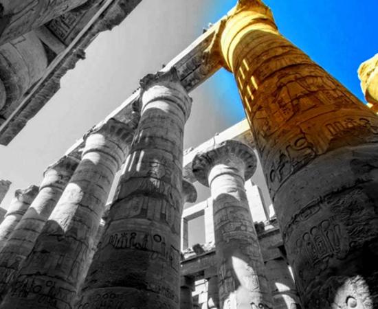 Enormous columns in the Great Hypostyle Hall at Karnak Temple complex, modern-day Luxor; design by Anand Balaji 