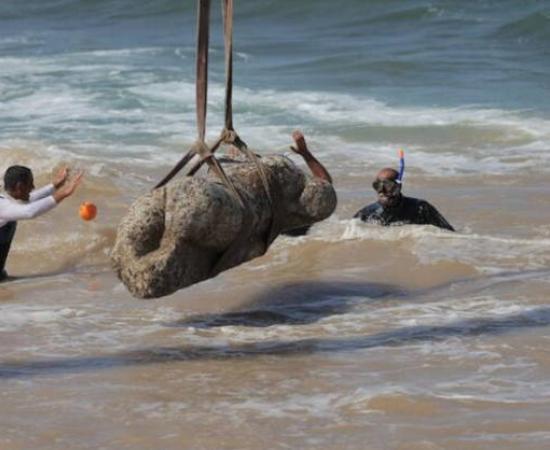 Divers raise the granite sphinx statue from Abu Qir Bay in Egypt.