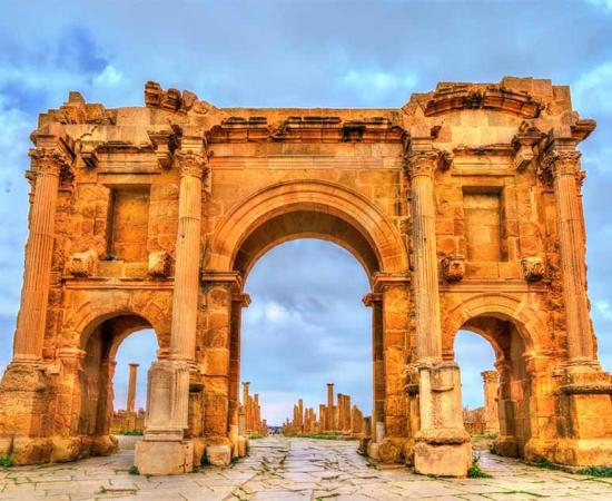 Trajan Arch, Timgad, Algeria. Source: Leonid Andronov / Adobe Stock.